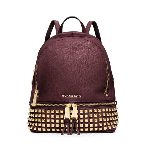 michael kors studded backpack.